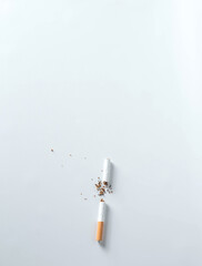 teared cigarette on white background concept for no smoking or quit smoking.