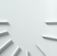 round of cigarettes isolated on white background with copy space  from top view.concept for illness, unhealthy.