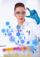 Woman researcher is surrounded by medical vials and flasks, isolated on white background