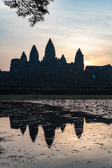 The temple complex of Angkor Watt, Cambodia, at dawn with reflection in lake
