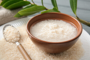 Fototapeta na wymiar Healthy rice water on table, closeup