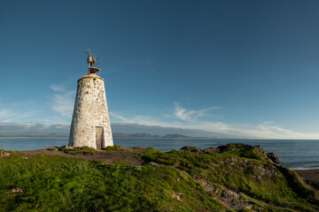 Fototapeta na wymiar North Wales coast with the Goleudy Tŵr Bach lighthouse, UK