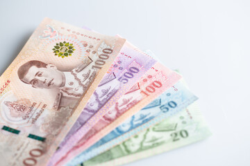 Thai bank notes in the current version are placed on a white background. 