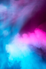 Fototapeta na wymiar Abstract colorful, multicolored smoke spreading, bright background for advertising or design, wallpaper for gadget. Neon lighted smoke texture, blowing clouds. Modern designed.