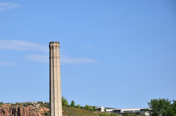 Fototapeta na wymiar Old factory chimney in the city of Arnedo. Today it is an industrial architectural heritage.