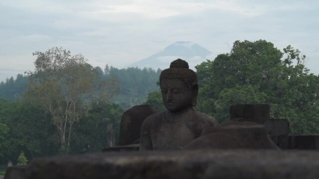 Candi Borobudur - Mahayana Javanese Buddhist Temple UNESCO World Heritage Site - Stupas and Buddha Statue in Yogyakarta Magelang, Central Java, Indonesia Indonesian