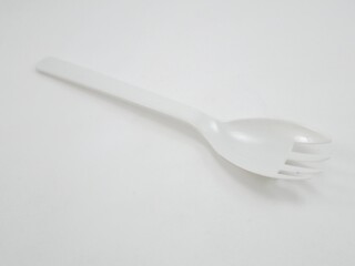 White spoon plus fork design utensil