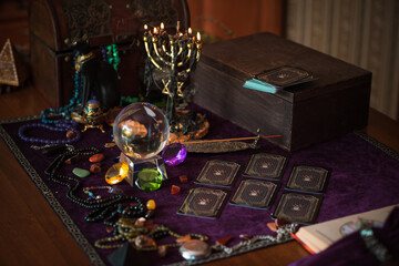 Tarot cards, Concept of fortune telling and predictions, magical rituals and wicca elements on a table