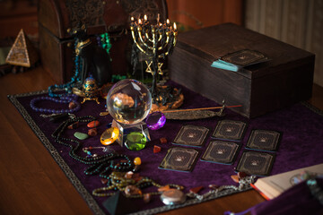 Tarot cards, Concept of fortune telling and predictions, magical rituals and wicca elements on a table