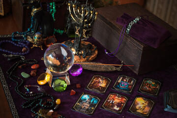 Tarot cards, Concept of fortune telling and predictions, magical rituals and wicca elements on a table