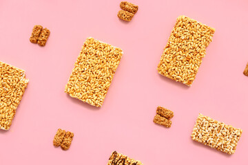 Crispy rice bars on color background