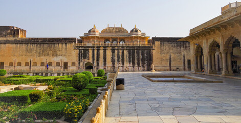 Beautiful courtyard garden inside Amber Fort and Palace in Jaipur in Rajasthan in India with...
