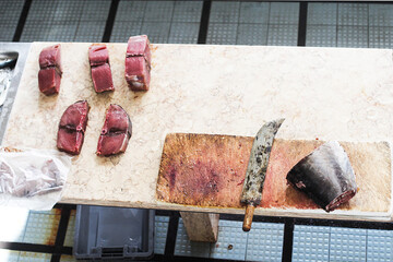 Fresh tuna steaks on a market