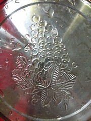 water on the steel or close up of coins