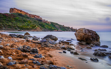 Ghajn Tuffieha; one of Malta's most well-known panoramic locations, seen from the rocky shore