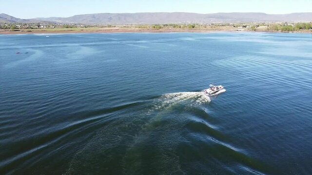 Smooth water and wake surfing at deer creek.