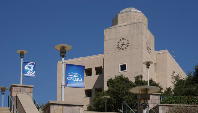 San Marcos, CA / USA - July 21, 2020: Logo Flag Of California State University San Marcos (CSUSM) With Academic Hall Building