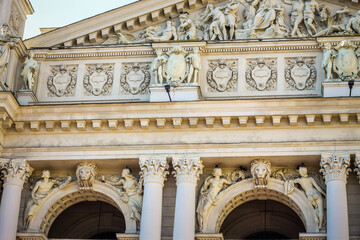 Fototapeta na wymiar closeup facade of Lviv opera and ballet theatre with different marble sculptures