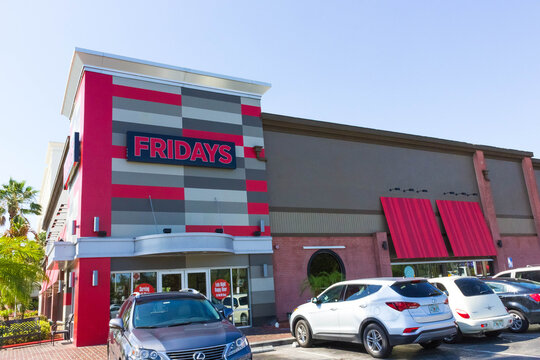 Orlando, USA - May 8, 2018: TGI Fridays exterior and logo. TGI Friday's is an American restaurant chain focusing on casual dining.