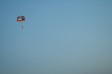paragliding in the blue sky