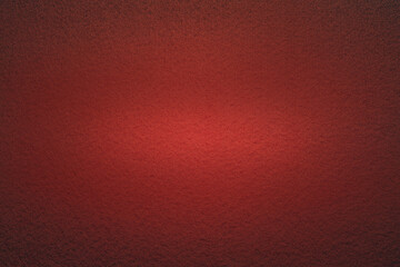 antique colored paper background texture with dark in old distressed vintage design. The color of the paper red Christmas texture