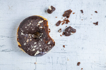 .Donuts on a white wood background