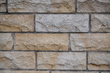 old grey brick wall texture background. Civil and industrial construction.