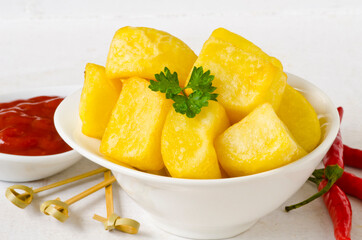 Spanish Cuisine. Traditional fried potatoes in hot sauce. Patatas Bravas.