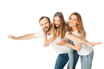 Obraz premium smiling daughter on father back near mother isolated on white