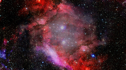 Hubble views galaxy and nebula. Elements of this image furnished by NASA