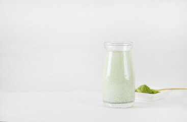 Matcha Latte, Green Tea Latte on White Background with Copy Space