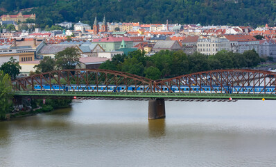Fototapeta na wymiar Railway bridge Prague with a locomotive