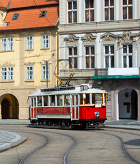Retro tram on the modern city streets