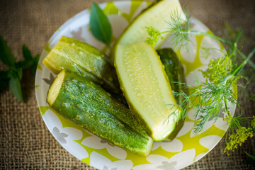 lightly salted cucumbers with spices in a bowl