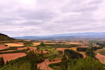 View of different cultivation fields and their contrast of colors in the Ebro Valley from Clavijo.