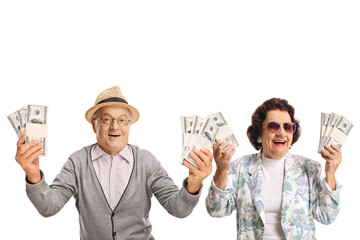 Elderly man and woman holding money and smiling
