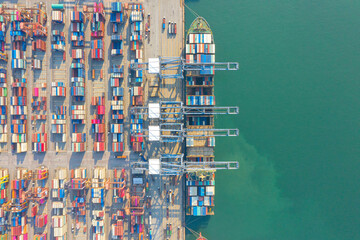 Container , container ship in export and import business and logistics. Shipping cargo to harbor by crane. Water transport International. Aerial view and top view.