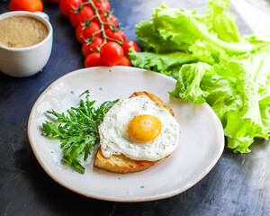 fried egg and toast bread salad delicious breakfast snack yolk and protein food background top view copy space eating healthy raw Takeaway