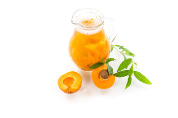 cold apricot compote in a glass decanter