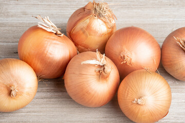 Sweet Southern-Grown Onions On A White Panel Board