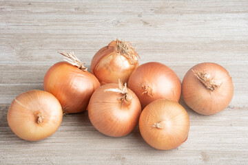 Sweet Southern-Grown Onions On A White Panel Board