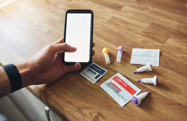 Fototapeta na wymiar Home blood test kit with blank phone screen