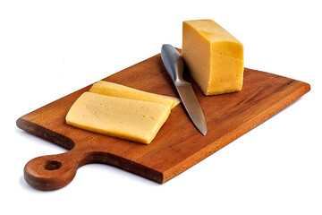 on a white background. No isolation. A small piece of cheese is cut into wedges. And a kitchen knife Close-up.
