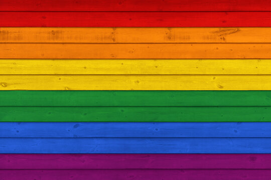 Rustic Old Weathered Wood Plank Background Texture in colours of LGBT Pride Flag