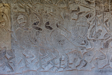 The temple complex of Angkor Watt, Cambodia wall relief depicting ancient wars