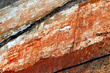 ABSTRACT- Close Up of an Ancient Stone Wall in Rome, Italy