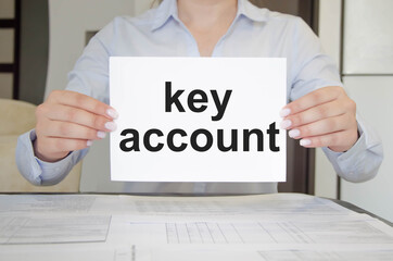 woman holds a tablet with text. text time to key account