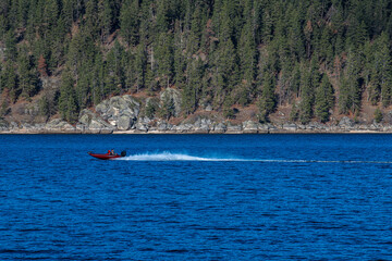 Fototapeta na wymiar High-speed Boat on Coeur D'Alene Lake, Idaho