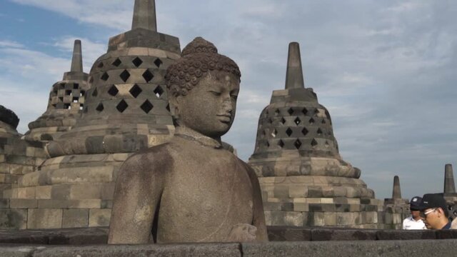 Candi Borobudur - Mahayana Javanese Buddhist Temple UNESCO World Heritage Site - Stupas and Buddha Statue in Yogyakarta Magelang, Central Java, Indonesia Indonesian