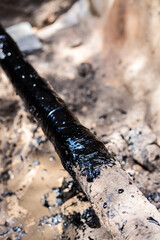 gas pipe in resin. Resin-treated pipe treated with resin.